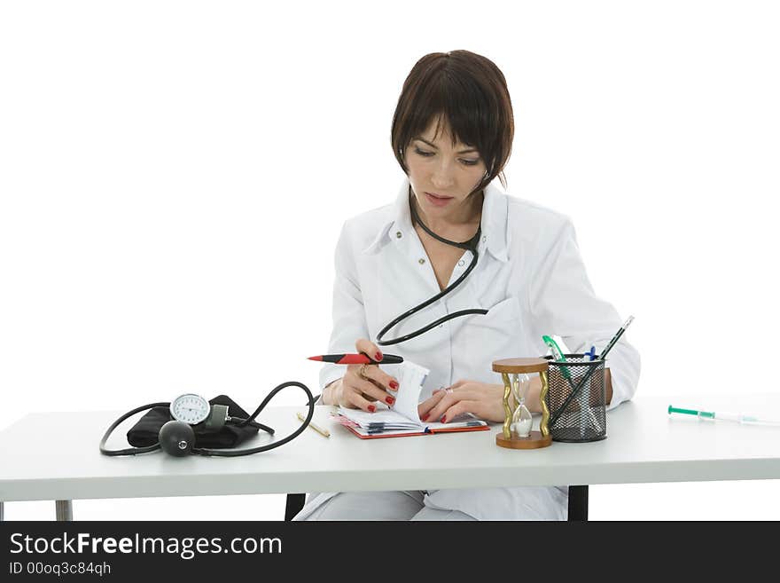 Young doctor with stethoscope on isolated background