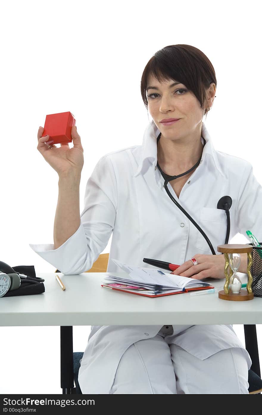 Young doctor with stethoscope on isolated background