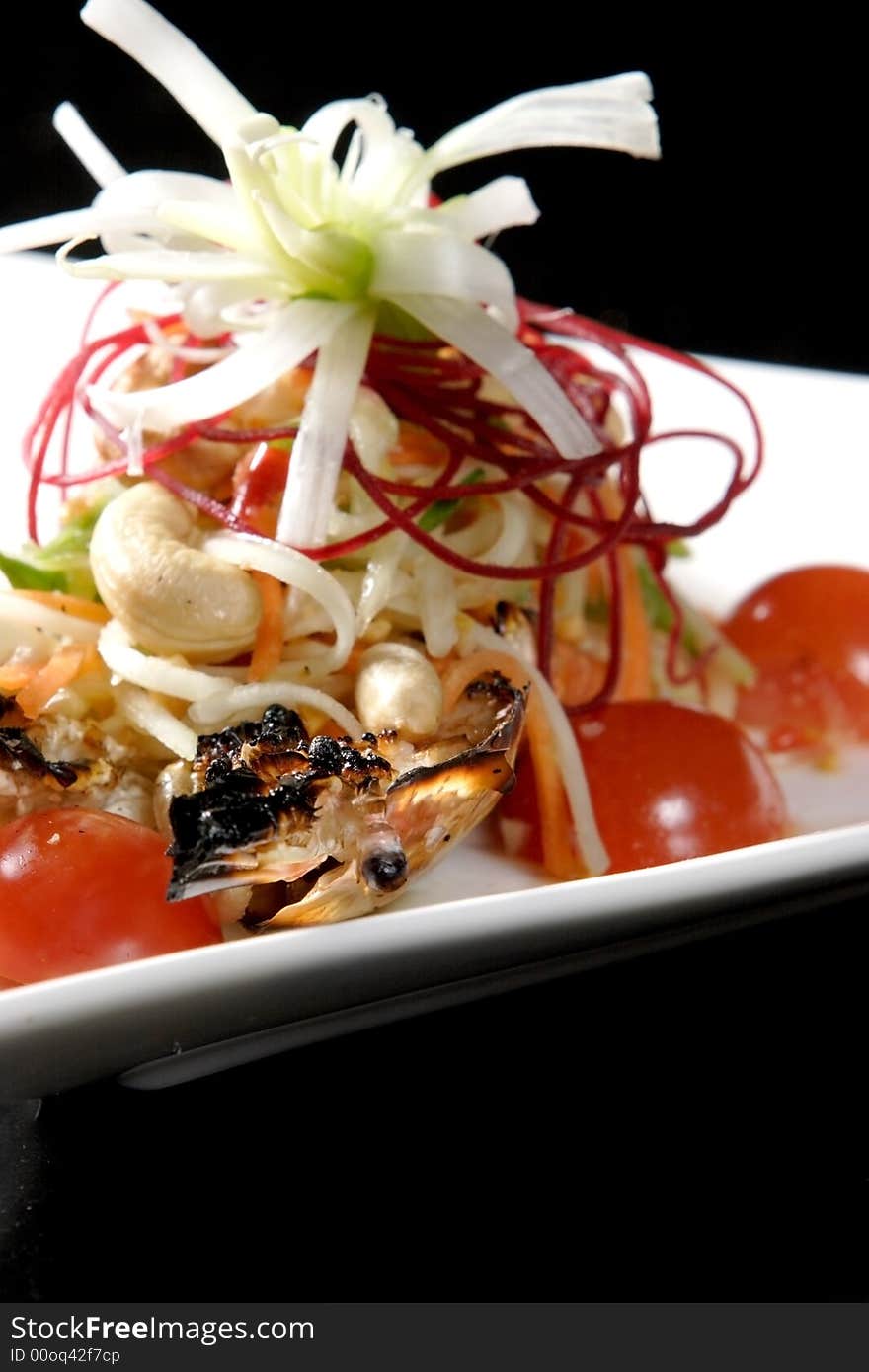 Asian Crab Salad served with whole Crab legs