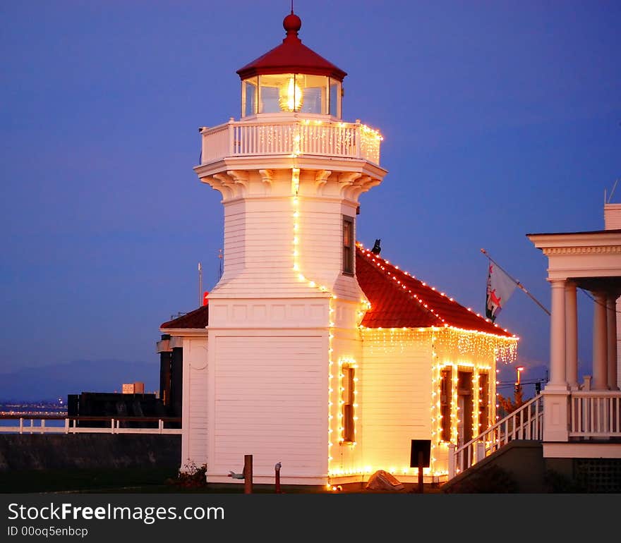 Lighthouse in the pacific northwest lighten up for christmas