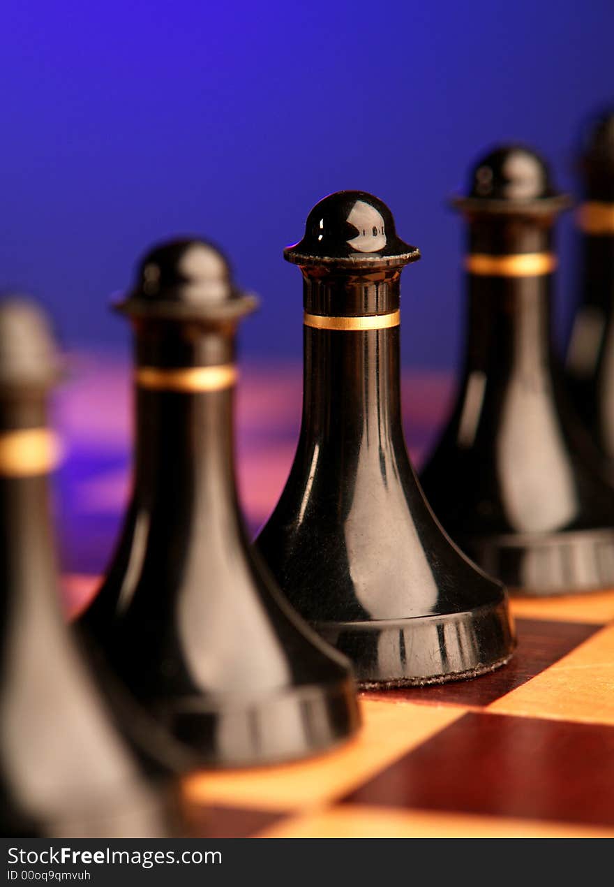 Chess on a background of a chessboard