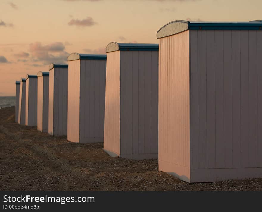 A line of cabins at the beach. A line of cabins at the beach