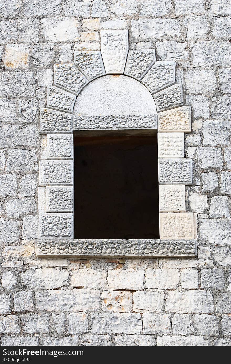 Old window on old Medieval castle