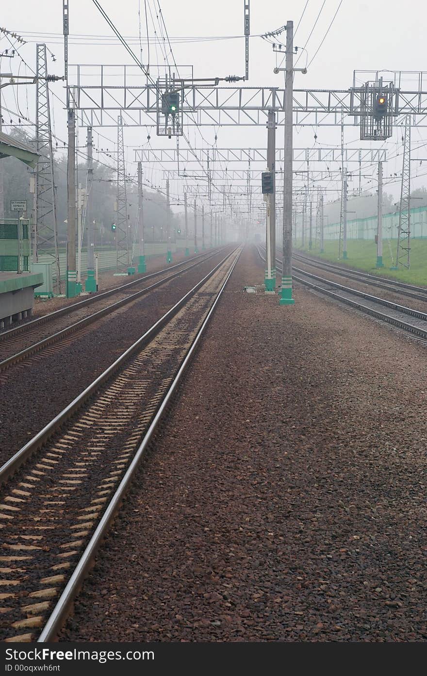 Railroad tracks in mist