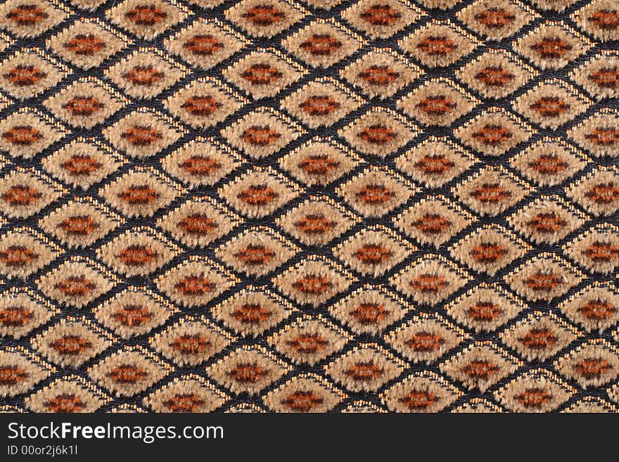 Brown fabric material texture with rhombs. Brown fabric material texture with rhombs