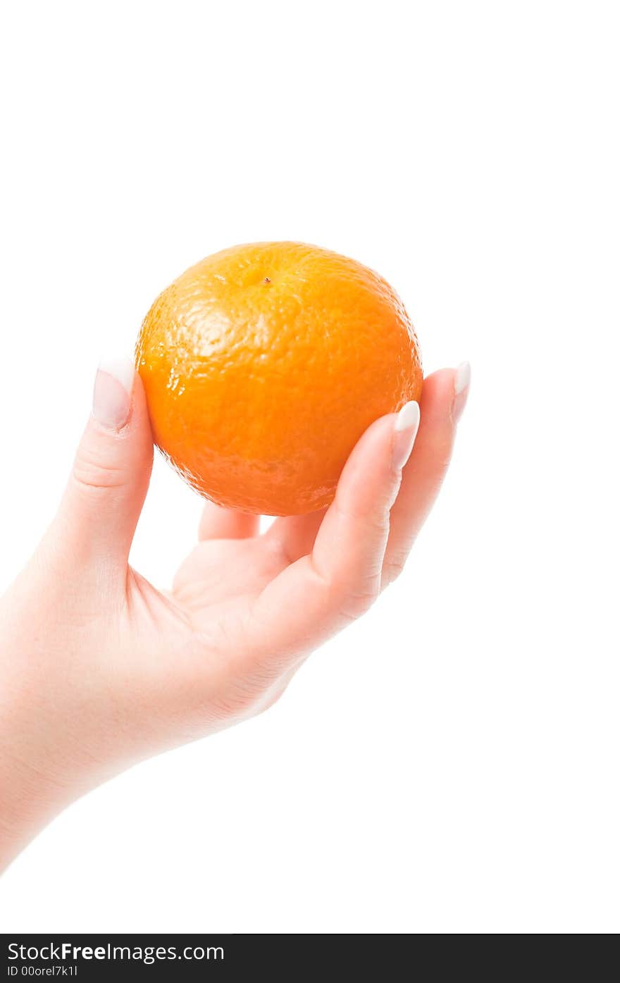 Womans hand holding a fresh mandarin. Womans hand holding a fresh mandarin