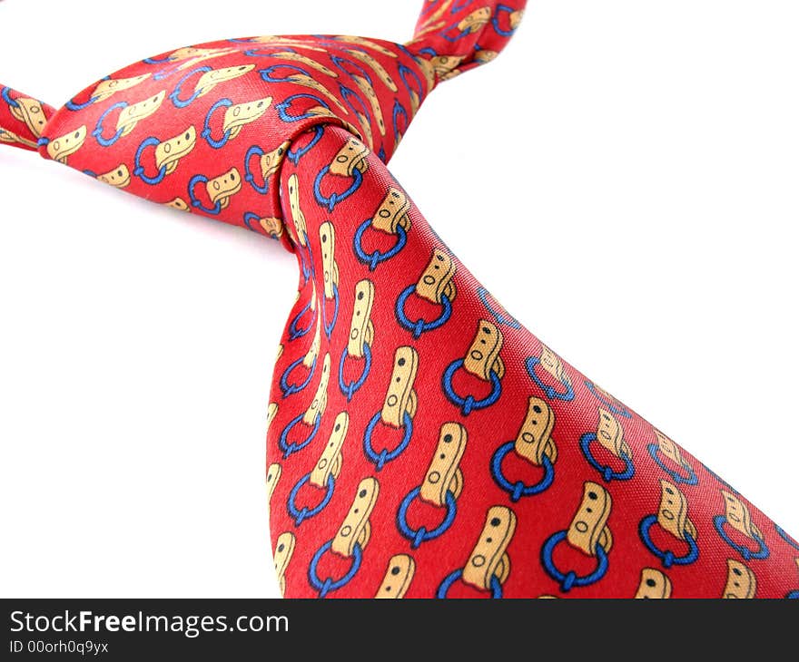 Red necktie fragment on white background. Red necktie fragment on white background