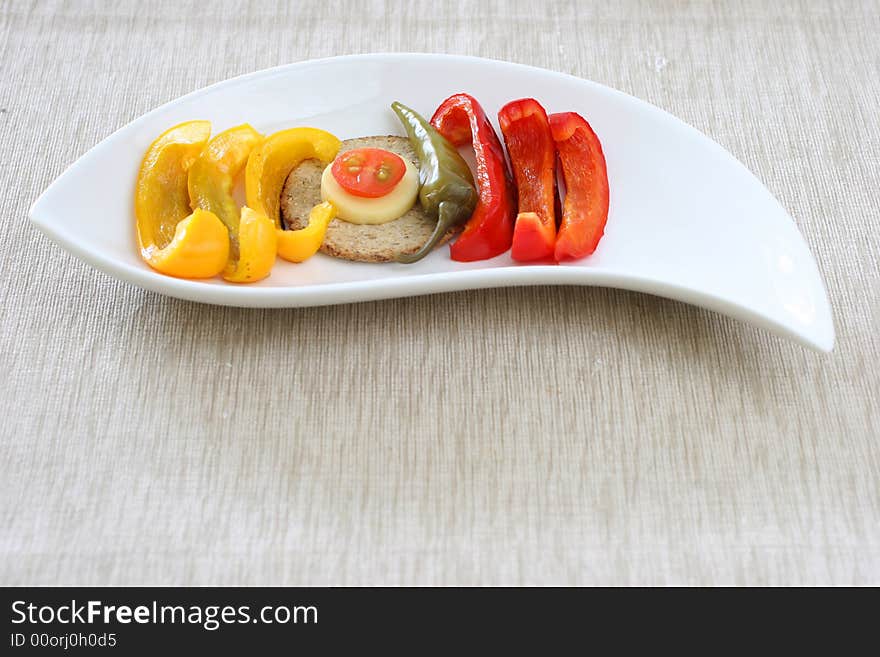 Healthy colorful platter with assorted vegetables on fancy white china. Healthy colorful platter with assorted vegetables on fancy white china