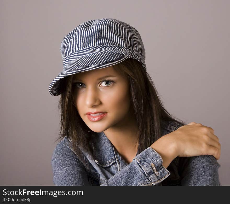 Brunette Cap Hand on Shoulder