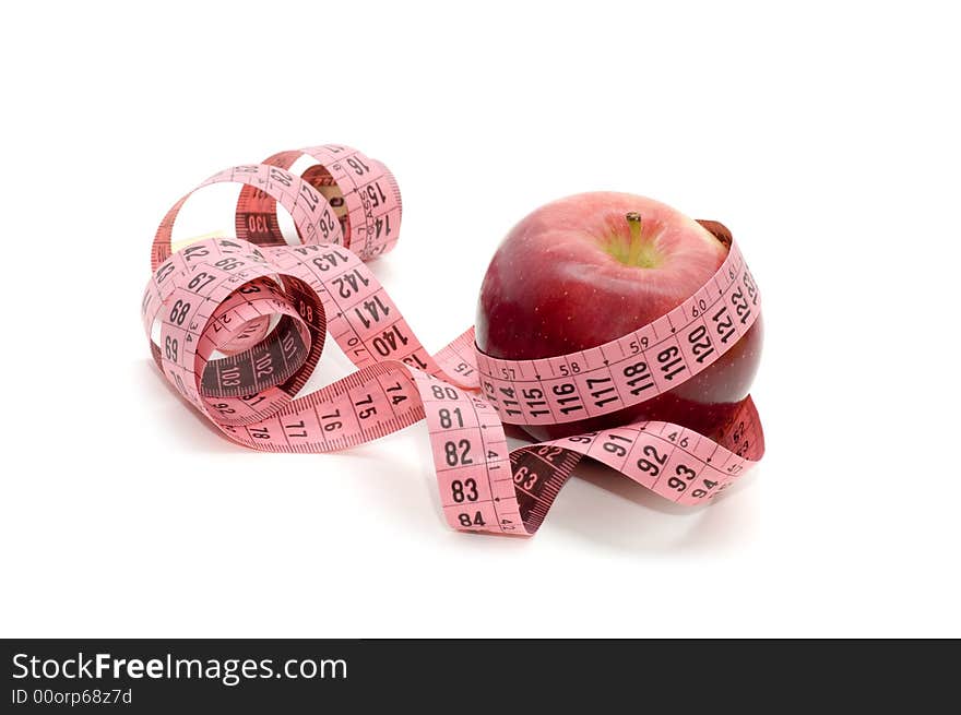 Apple and measuring tape isolated on a white