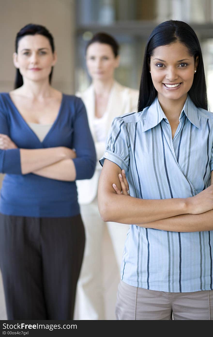 Businesswoman With Team Behind