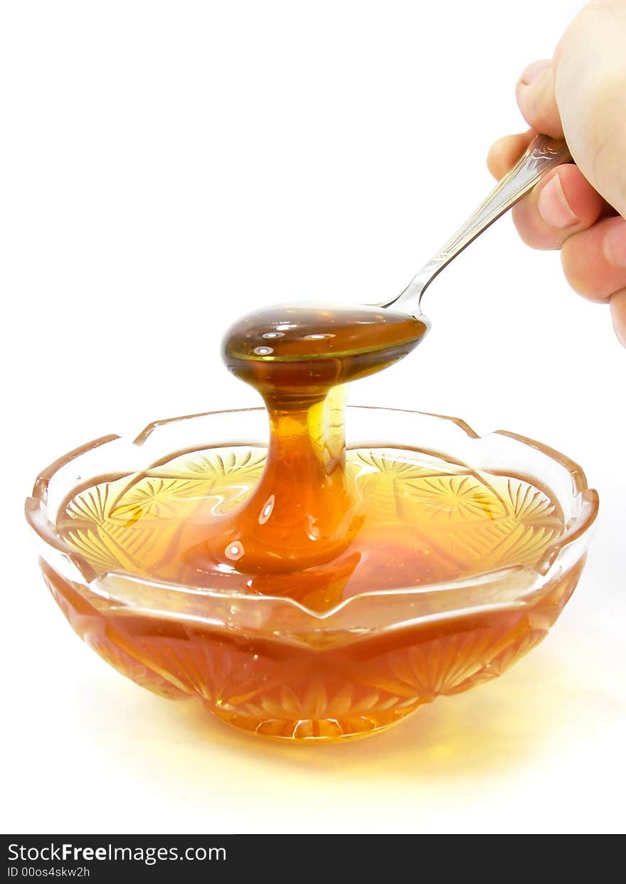 Honey in a crystal saucer