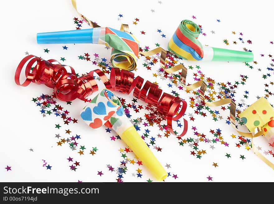 Red and golden ribbons and small confetti colorful