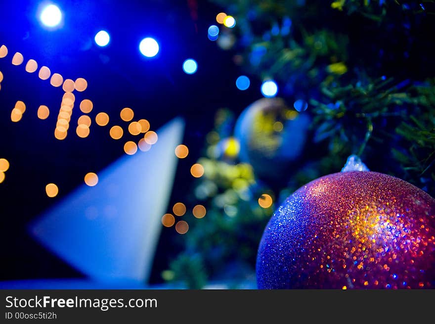 Close-up of Christmas Tree with red and gold ornaments and lights