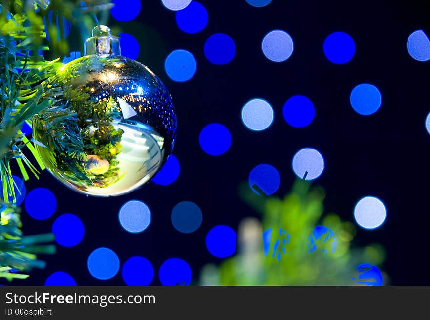 Close-up of Christmas Tree with red and gold ornaments and lights