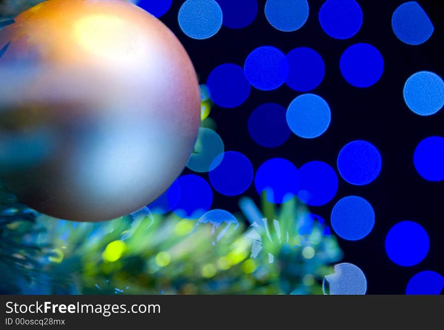 Close-up of Christmas Tree with red and gold ornaments and lights