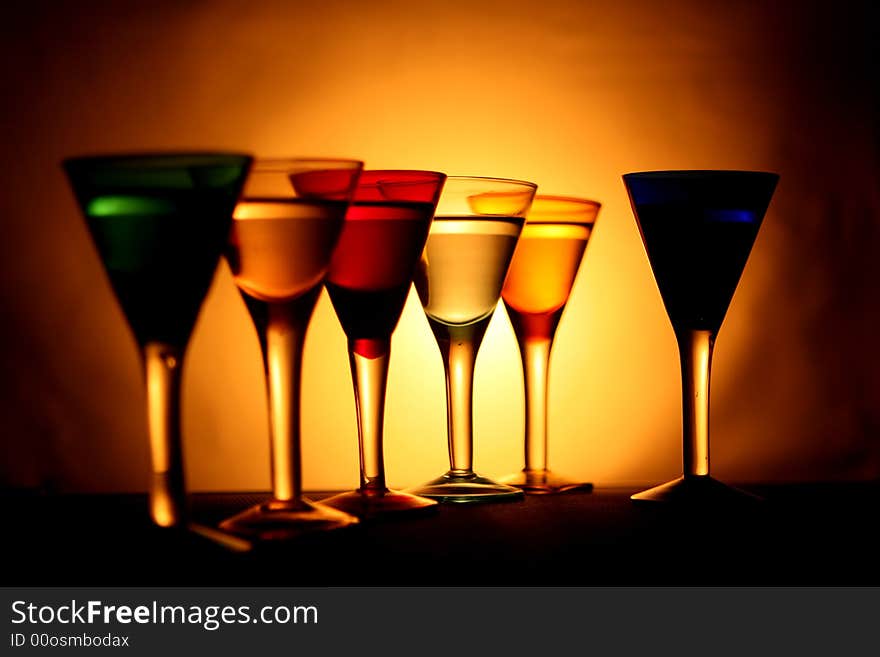 Six colored glasses in the light