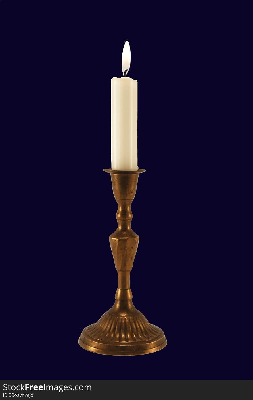 Candle-light with candelabrum isolated on dark blue.