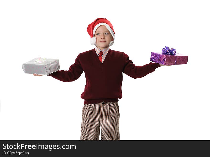 The boy in a cap Santa with a gift on a white background. The boy in a cap Santa with a gift on a white background