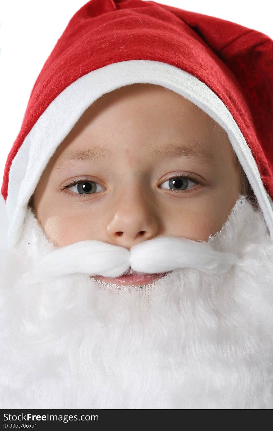 Portrait of the child in a red hat close up