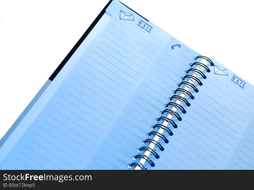 A blank page in a spiral bound notebook, with clipping path. A blank page in a spiral bound notebook, with clipping path.