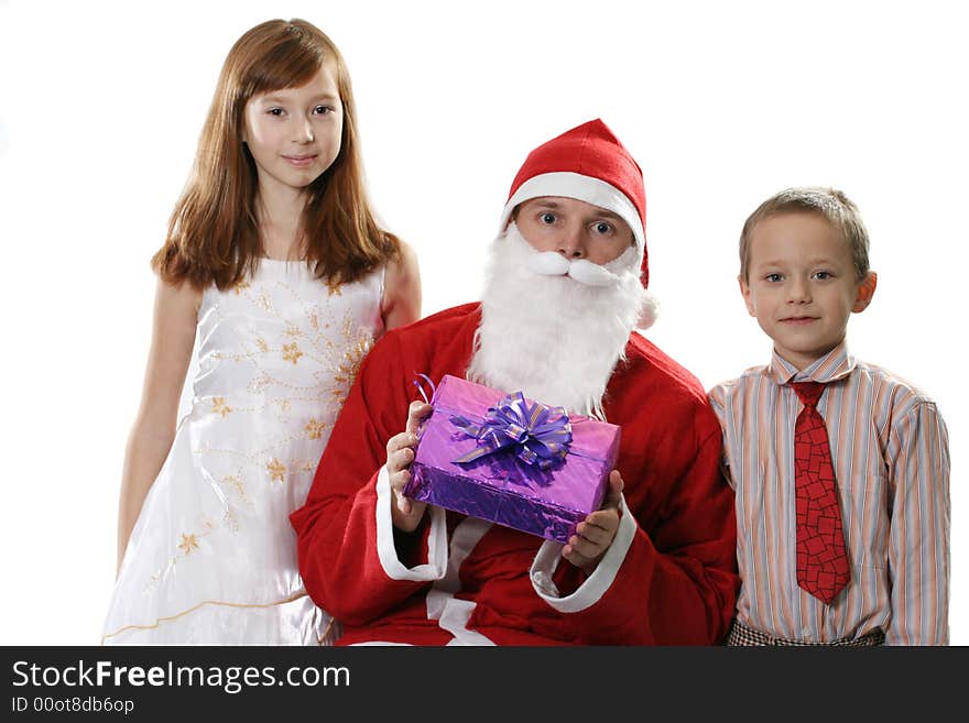 Santa together with two children and a gift on a white background