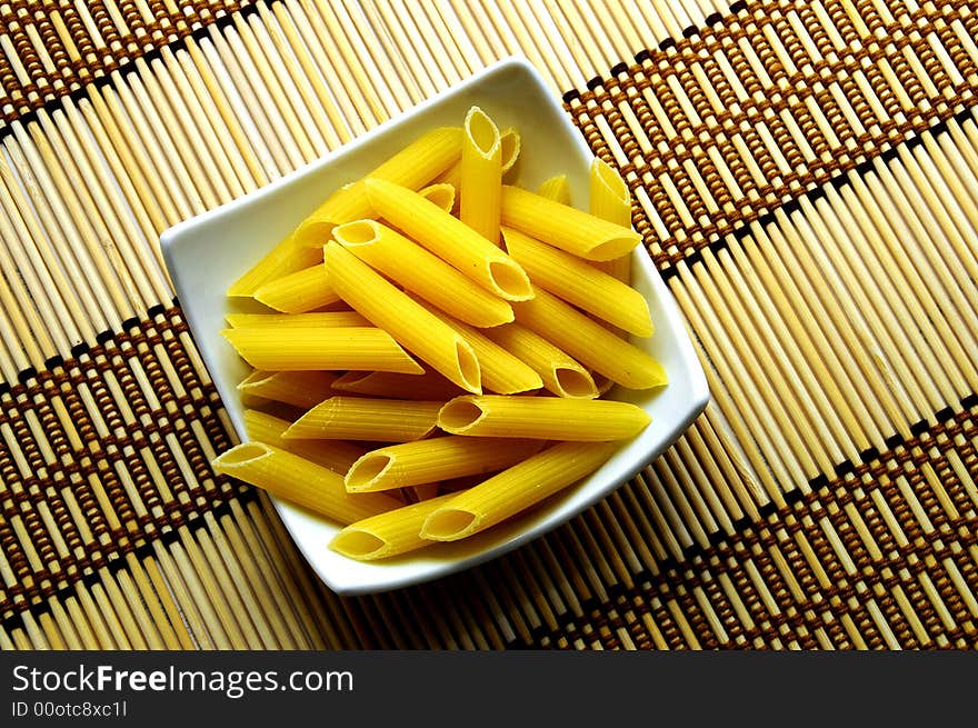 A view with pasta on a white plate