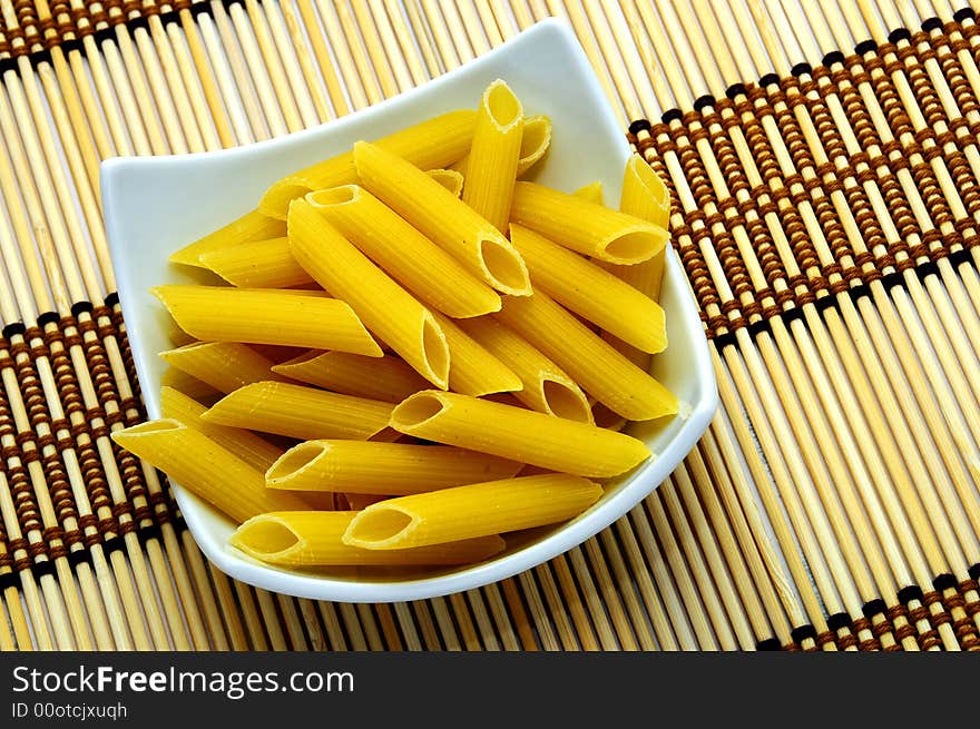 A view with pasta on a white plate