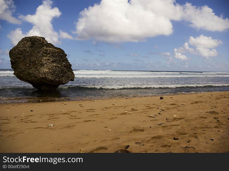 Waves come into shore along a peaceful beach in Barbados. Waves come into shore along a peaceful beach in Barbados