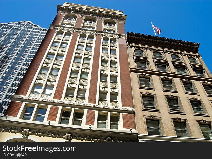 Art Deco and modern buildings mix in downtown San Francisco.