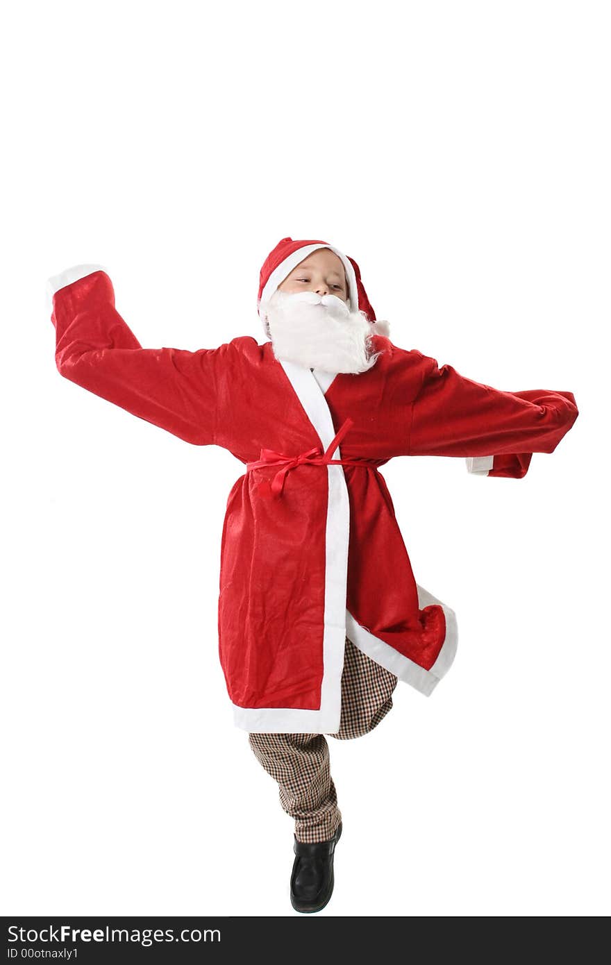 The boy in suit Santa jumps on a white background. The boy in suit Santa jumps on a white background