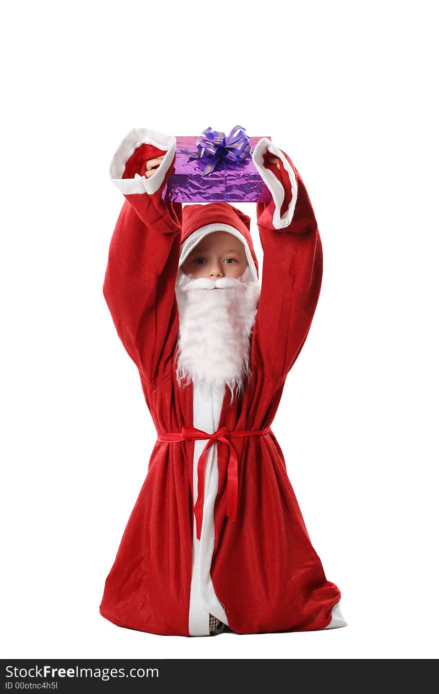 The boy in a suit Santa with a gift in hands on a white background