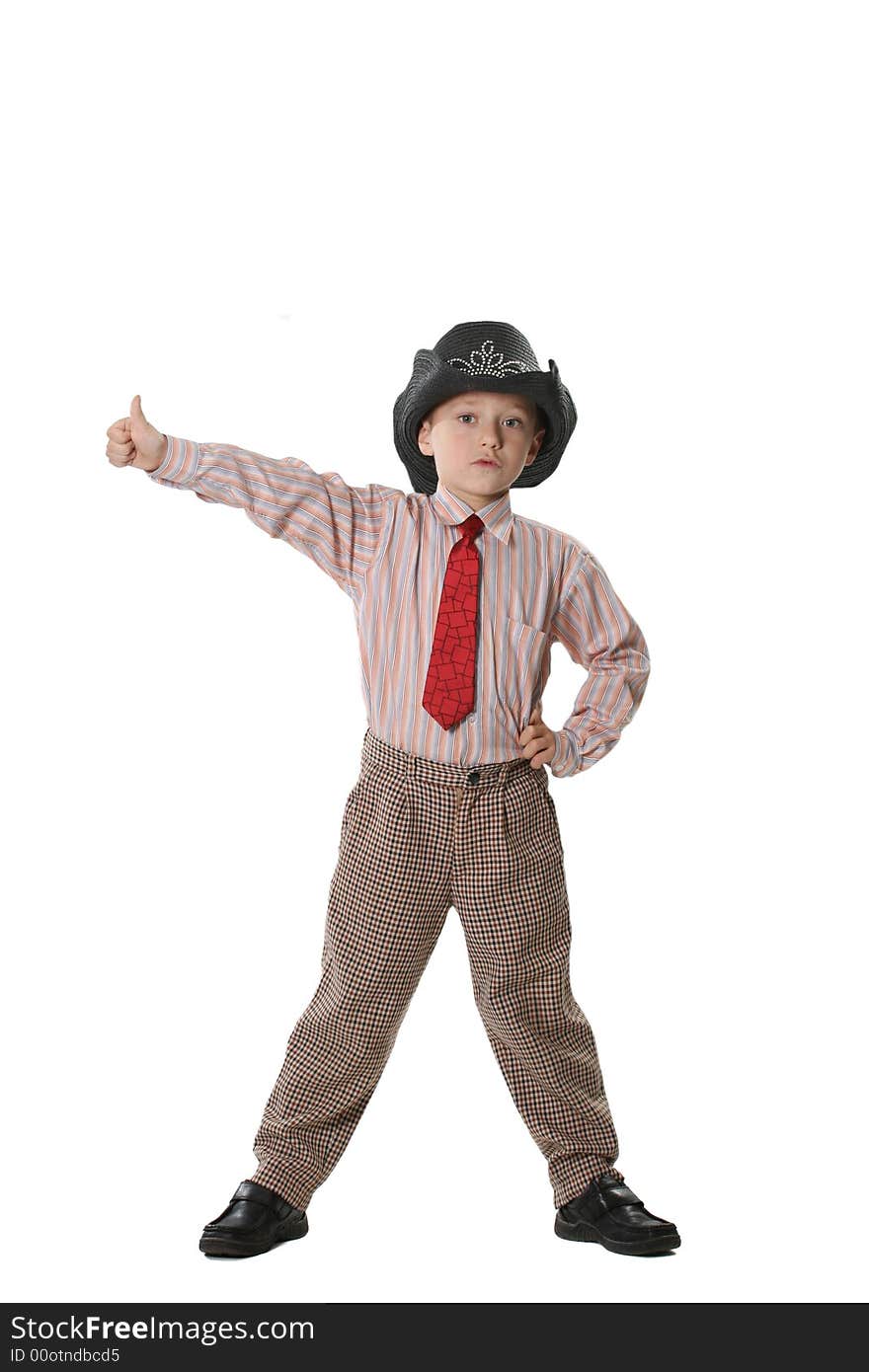 The boy in a cowboy's hat and a red tie