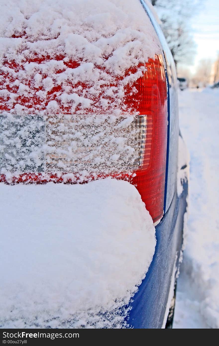 Car bumper covered by snow