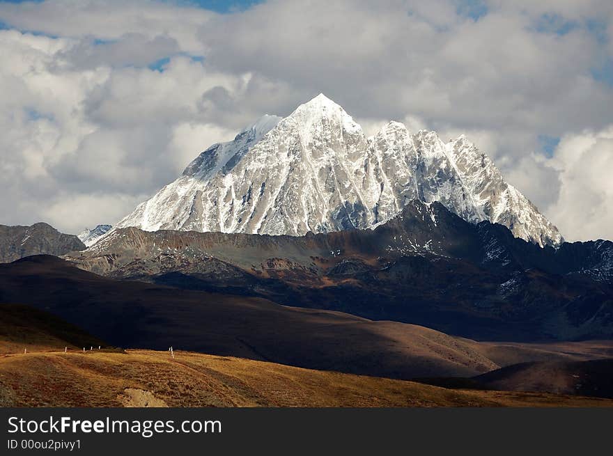 View the jokul from a desolate meadow.