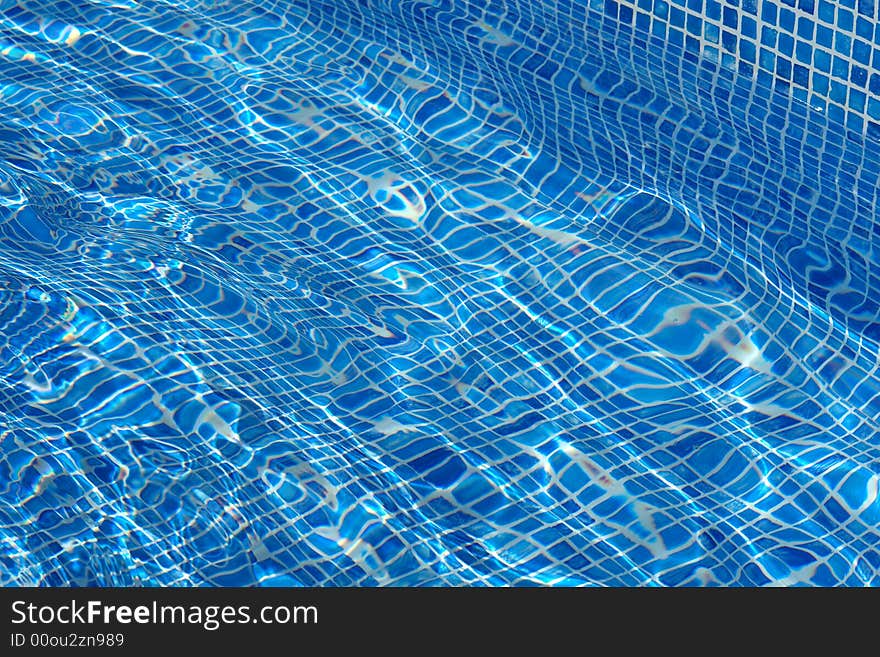 Light reflections on water,in a pool