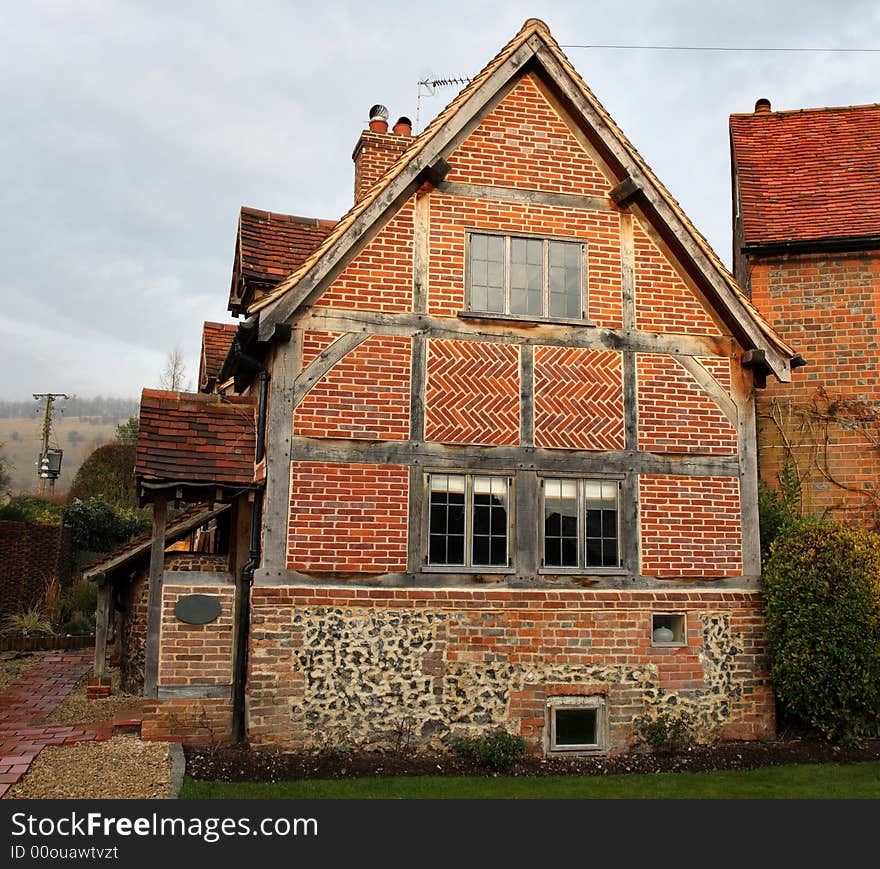 Traditional Timber Framed English Village Cottage with Herringbone brickwork