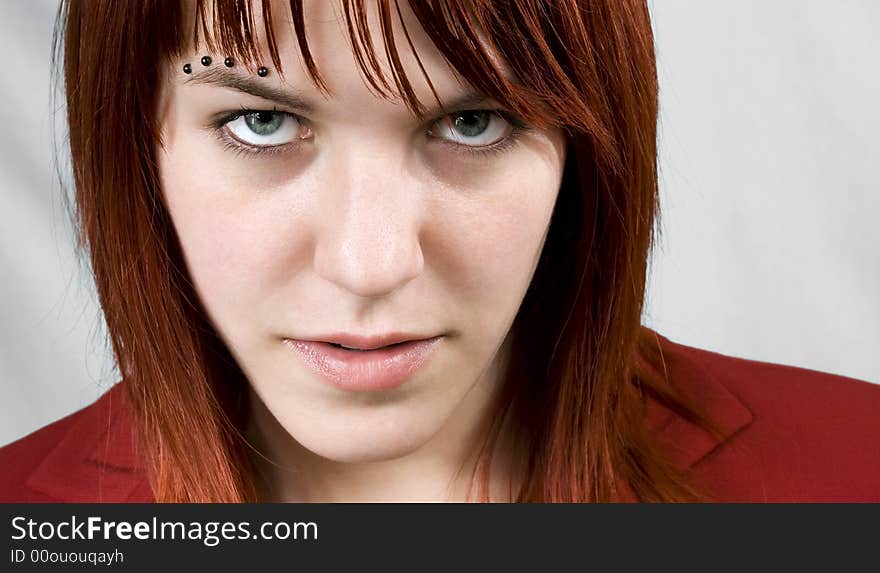 Cute redhead girl aggressively staring at the camera.

Studio shot. Cute redhead girl aggressively staring at the camera.

Studio shot.