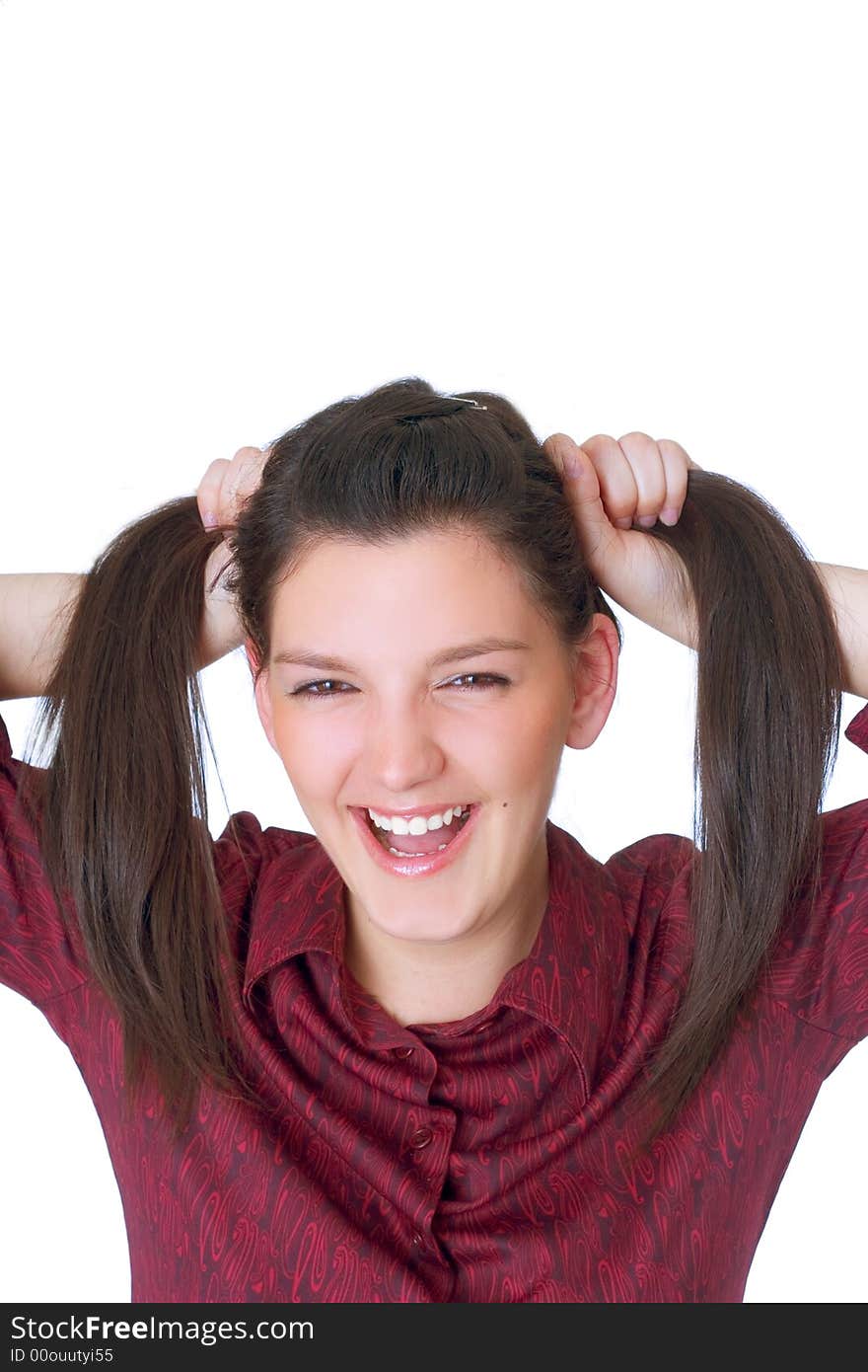 Happy teen holding her hair