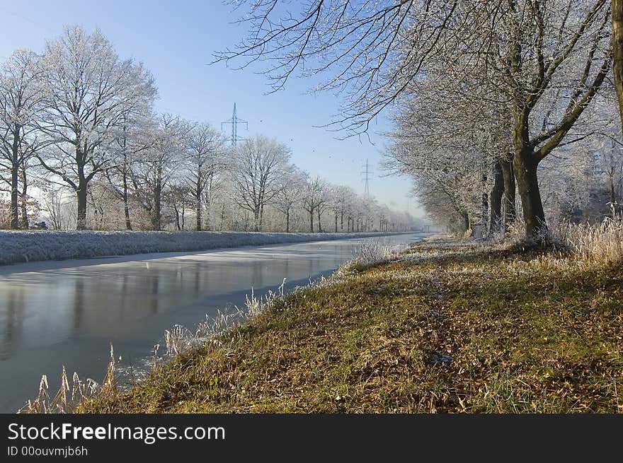 Winder wonderland water blue sky background. Winder wonderland water blue sky background