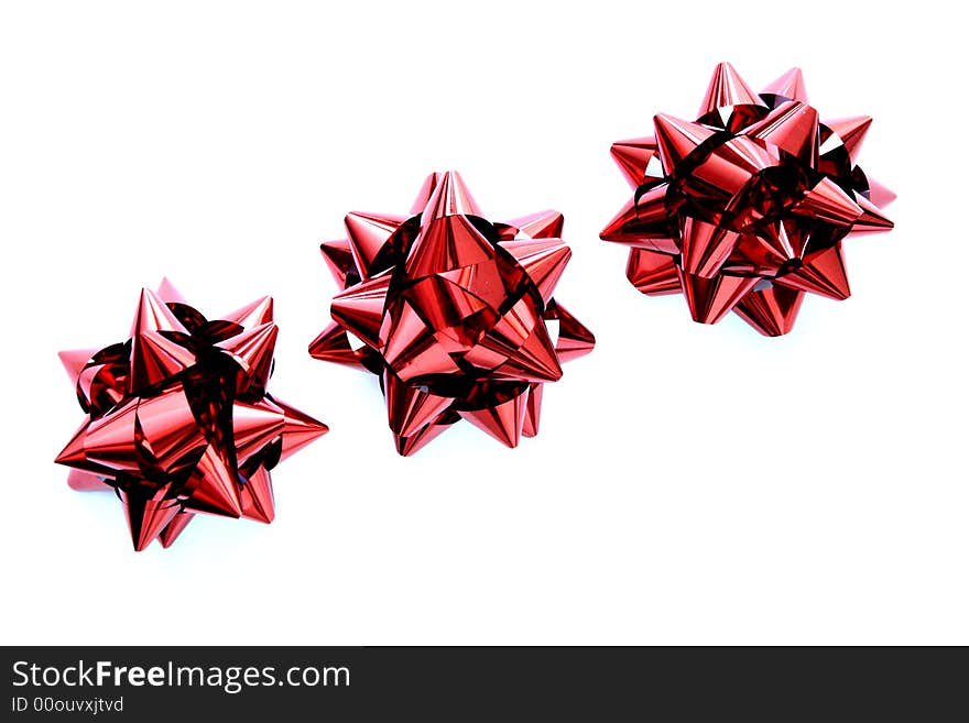 Three red gift ribbon isolated on white. Three red gift ribbon isolated on white