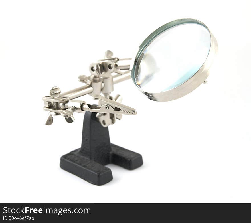 Clip with a magnifier