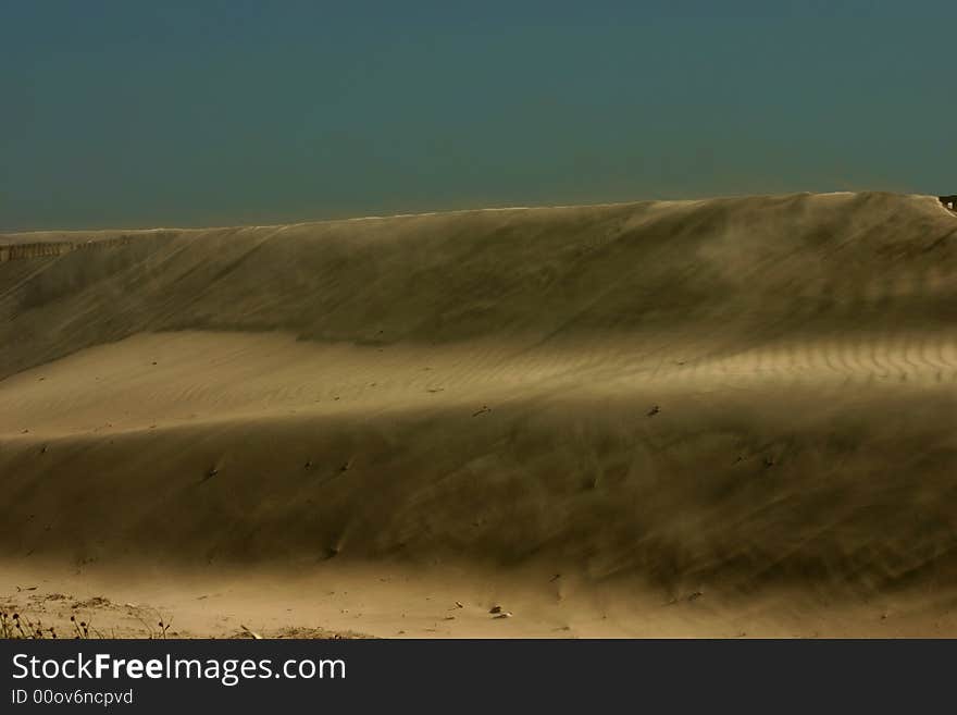 Spanish beach with wind and dunes