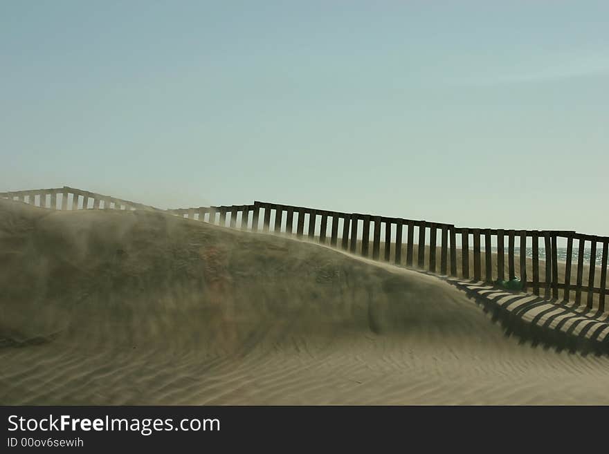 Spanish beach with wind and dunes