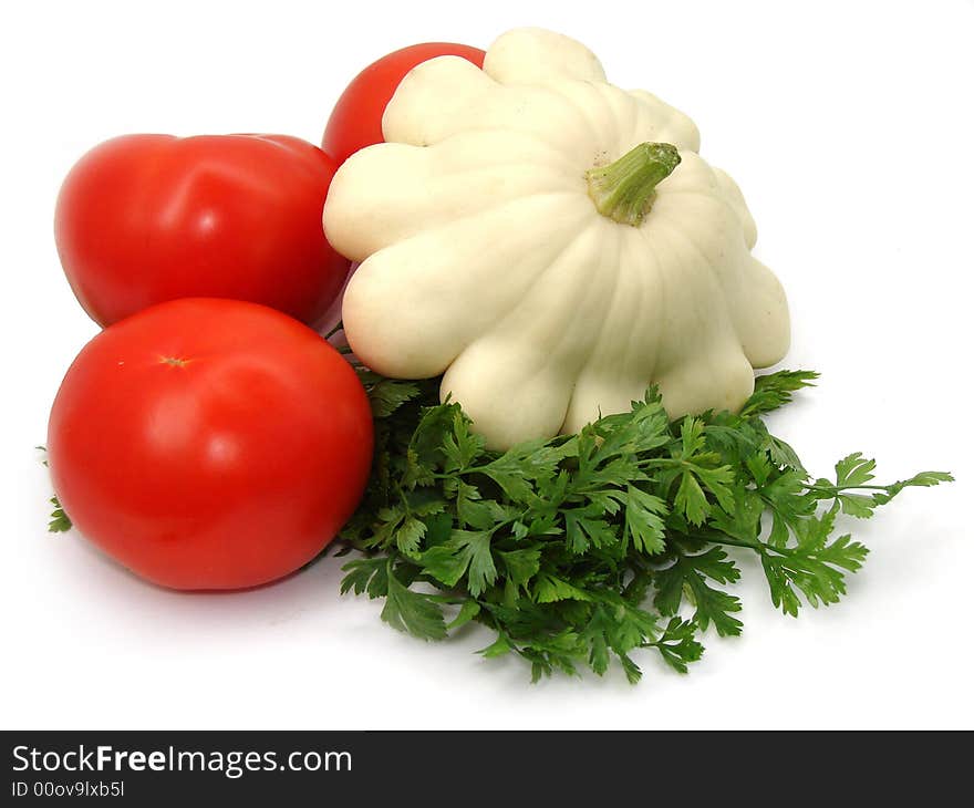 Tomatoes, cymbling and parsley on white background