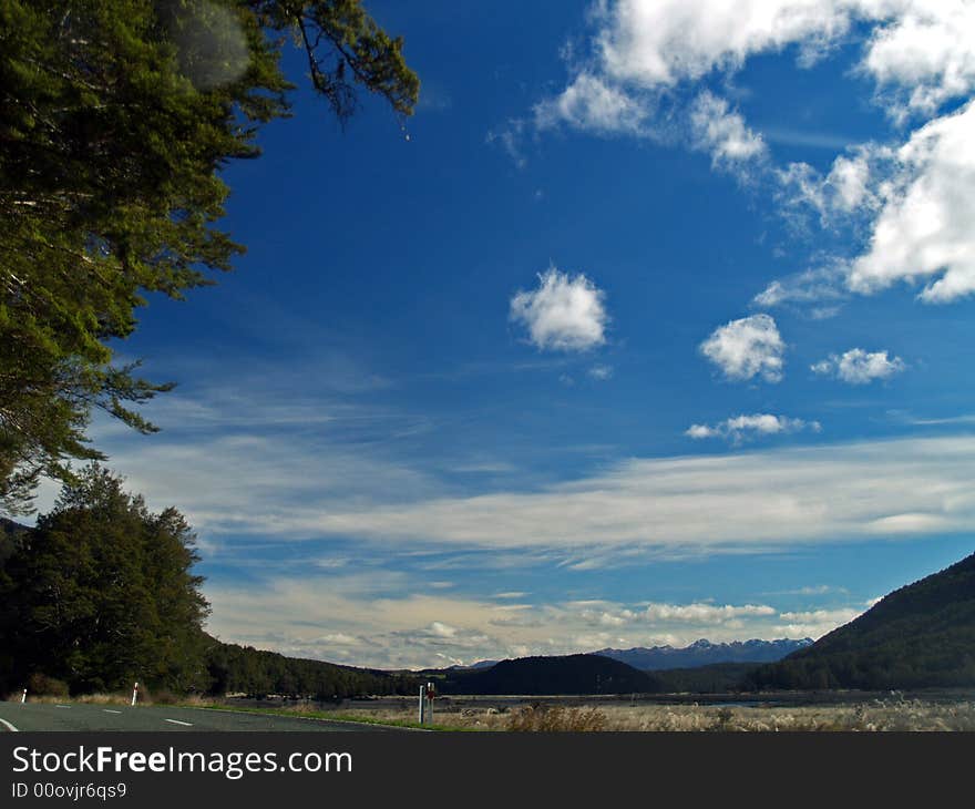 The road to Milford is one of New Zealand’s most scenic drives. The first part is relatively mild farmland, then you’ll ease into beech forest near the entrance to the Fiordland National Park. Look for the Avenue of the Disappearing Mountain and the Mirror Lakes.
Beautiful Milford Sound, described by Rudyard Kipling as the ’eighth wonder of the world’. A cruise on Milford Sound will be an essential component of your time in Fiordland, or you can get up close and personal in a sea kayak. Tall waterfalls, vertical rock faces and seals are some of the things you’ll remember