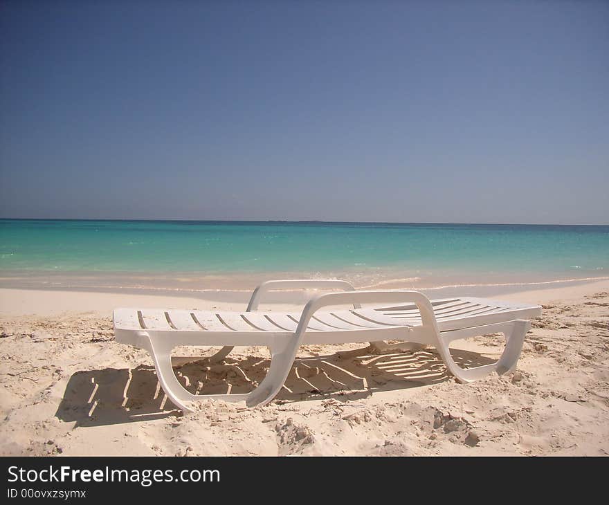 Beach chair at a beach in the Caribbean. Beach chair at a beach in the Caribbean