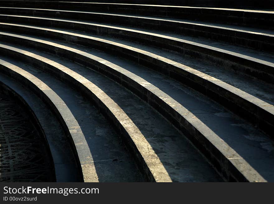 Curved lines on concrete step. Curved lines on concrete step