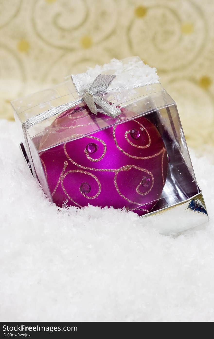 Candle in box with snow