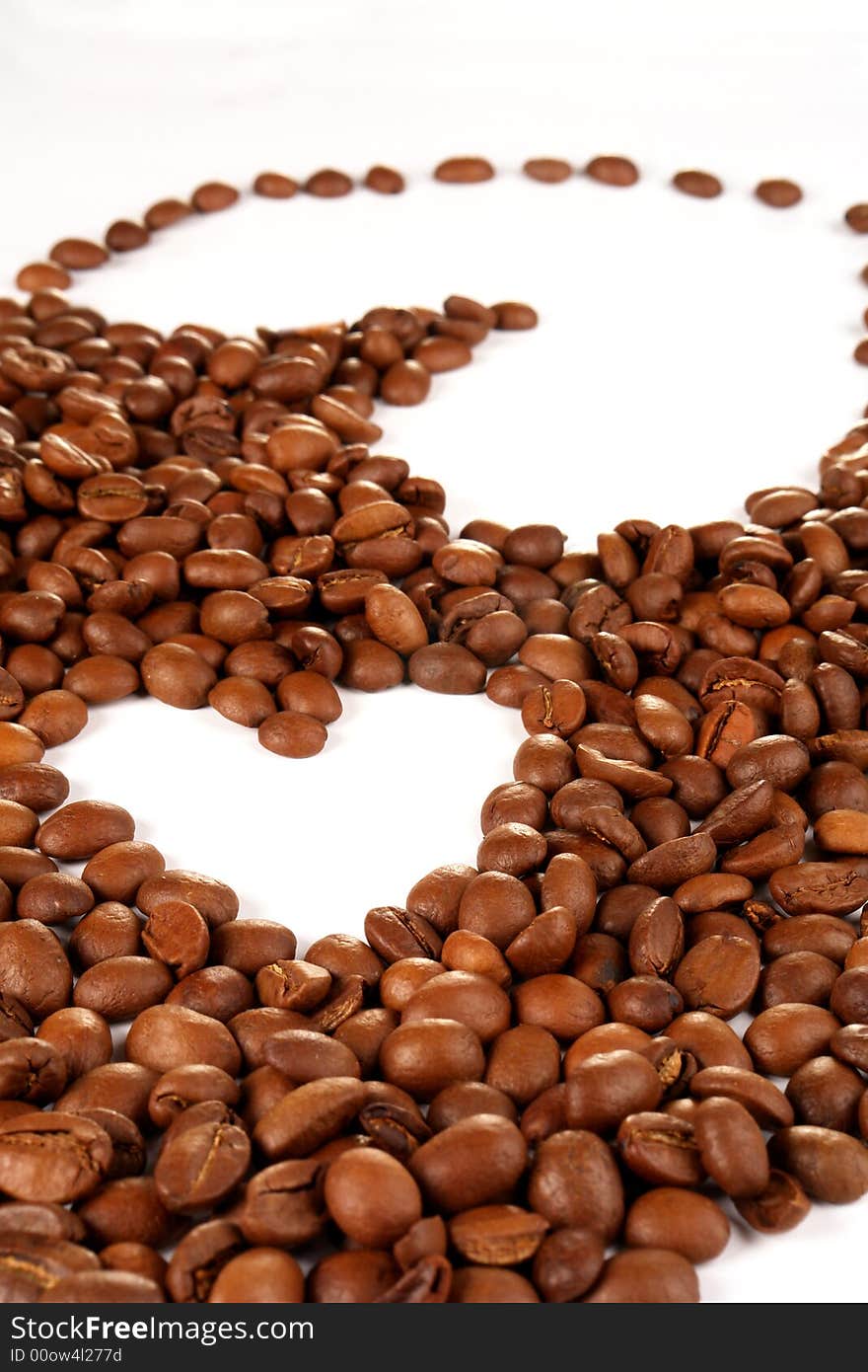 Grains of coffee on a white background